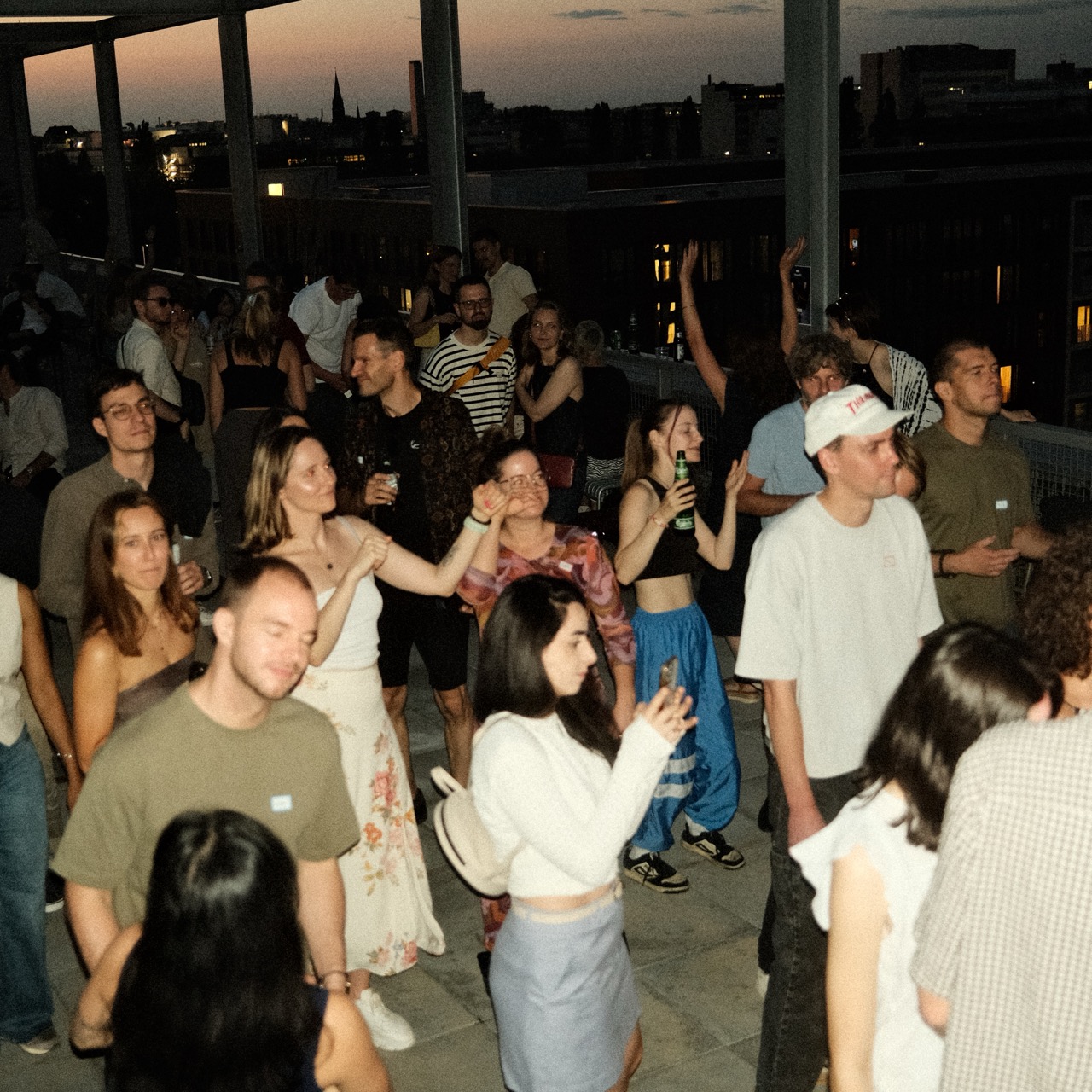 Crowd scene from a previous rooftop gathering
